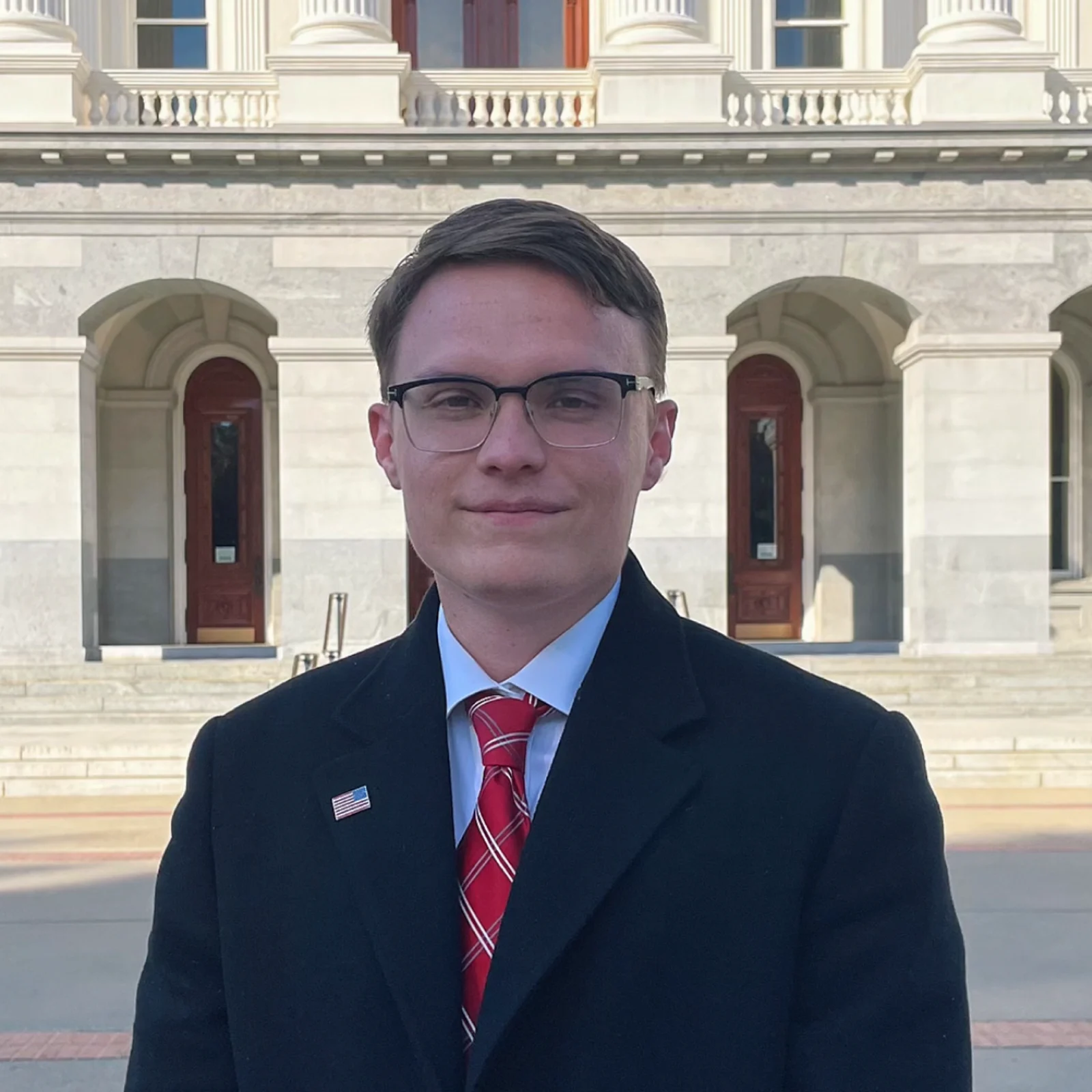 Solo portrait of Kyle Langford outside the California State Capitol